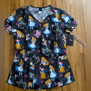 NWT Tooniforms women’s Alice in wonderland scrub top size XS